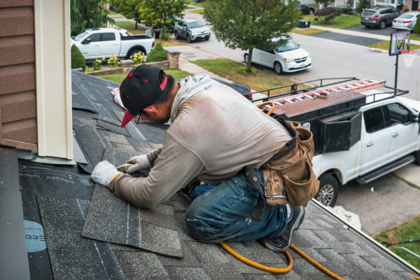 Professional Roofing technician working in Haydenville, MA